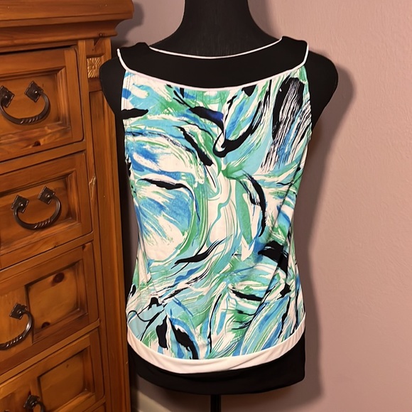 This is a blue abstractly patterned tank top with black trim - Picture 3 of 5